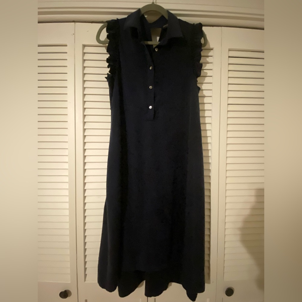 Maternity: navy knee-length dress with ruffled sleeves and button collar
